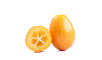 One whole kumquat with stem and half sliced one isolated one white background