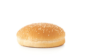 Hamburger bun with sesame seeds isolated on white background