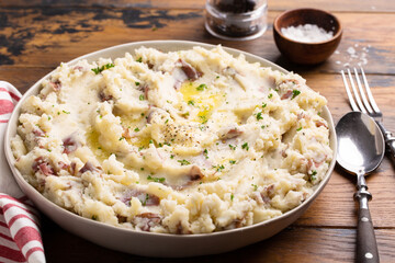 Traditional southern garlic mashed potatoes made with red potatoes skin on
