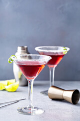 Traditional Cosmopolitan martini with sugared rim and lime twist