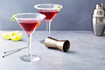 Traditional Cosmopolitan martini with sugared rim and lime twist