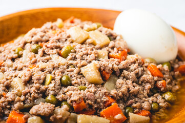Pork Giniling (Minced Pork) with Vegetable and Boiled on the Side (Side Shot Focused)- is a simple and famous Filipino dish usually served daily at home or in small eateries.