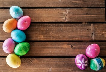 Easter eggs on wooden background with a copy space 