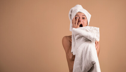 close-up of beautiful young woman with bath towel 