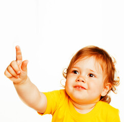 little cute baby girl pointing isolated on white