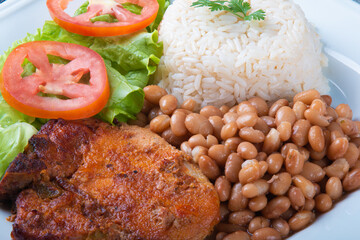 Traditional dish of Brazilian food beans with rice