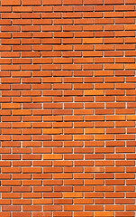 House wall built with red bricks.