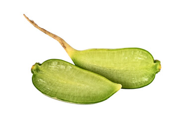 The green radish is cut into two juicy halves and laid out on a white background. Healthy eating. Diet. Ecological products. Vegetarianism. Cooking.