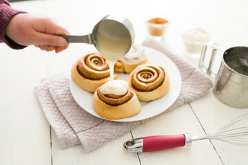 Baked sweet buns served on a plate to eat as dessert