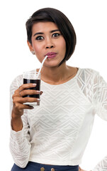 Beautiful asian woman drinking cola. Studio shot