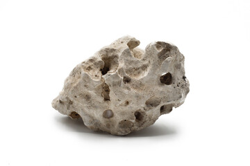 Porous rock isolated on white background with shadows. Permeable rocks, porous, lava rock and...