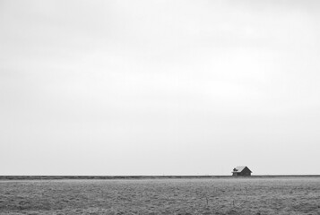 lonely icelandic house on the cold landscape
