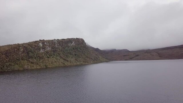 landscape in the paramos of sumapaz with lake and Espeletia