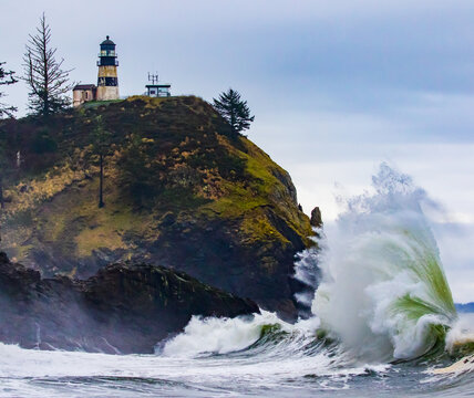 Large Wave Crashes Onshore At Cape Disappointment Lighthouse