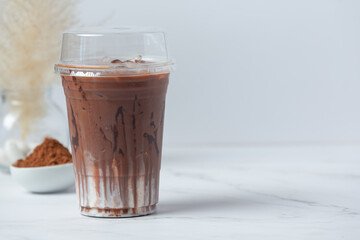 Ice chocolate with whipped cream on white background