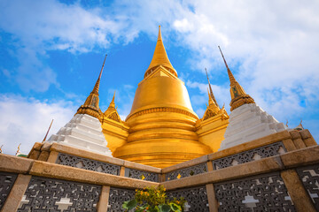 Wat Phra Kaew in Bangkok is a sacred temple and it's a part of the Thai grand palace, the Temple that houses an ancient Emerald Buddha