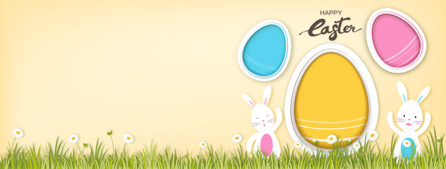 Bunnies with empty colorful eggs for adding your texts or pictures in beige color banner background with happy Easter text