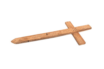 Wooden cross on white background.