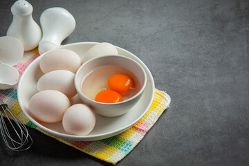 Duck eggs on dark background