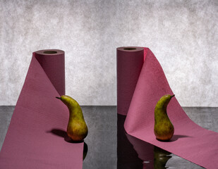 Still life with ripe pear and paper towel