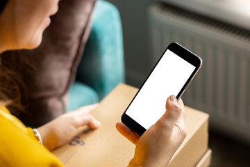 Young woman received package at home. Home shopping and delivery concept