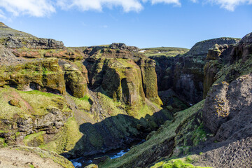 Fototapeta na wymiar Deep canyon of Skogarfoss river at the Fimmvoerduhals hiking trail, Iceland