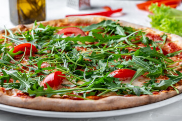 Pizza Margherita with Fresh Arugula Leaves, Tasty pizza with vegetables and arugula