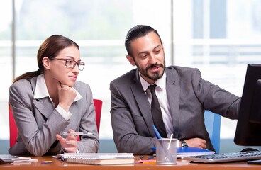 Woman and man in the business concept