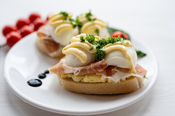 prosciutto dry hure ham with egg mayo dressing open bread sandwich with salad vegetables finger party food 