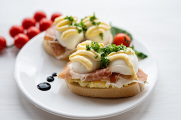 prosciutto dry hure ham with egg mayo dressing open bread sandwich with salad vegetables finger party food 