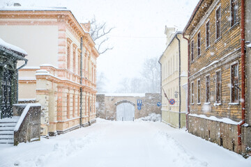 Snowy street in the historical center of Cesis, Latvia. Selective focus