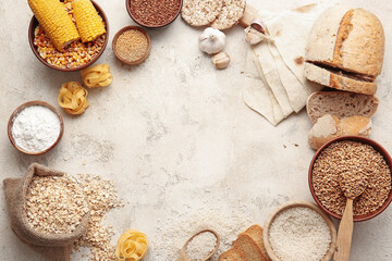 Frame made of different products on light background