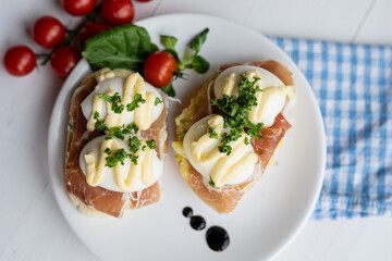 prosciutto dry hure ham with egg mayo dressing open bread sandwich with salad vegetables finger party food 