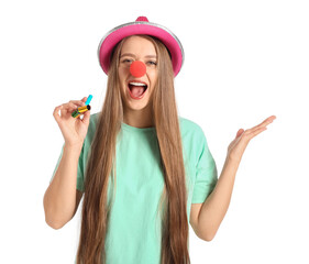 Young woman in funny disguise on white background. April Fools Day celebration