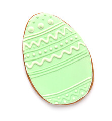Tasty Easter cookie in shape of egg on white background