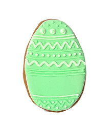 Tasty Easter cookie in shape of egg on white background