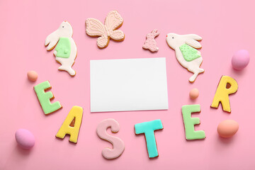 Empty paper sheet with tasty Easter cookies and eggs on color background