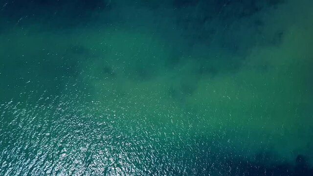 Drone shot of the colors of the water at Nahuel Huapi lake, near Puerto Blest