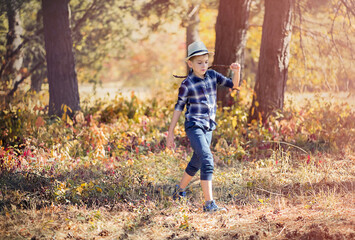 child running in autumn park