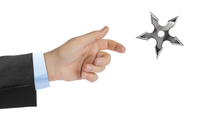 Hand is throwing ninja shuriken © Nikolai Sorokin