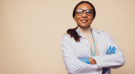 Female doctor with her arms crossed