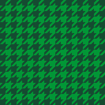 Goose foot. St. Patricks day pattern of crow's feet in green cage. Glen plaid. Houndstooth tartan tweed. Dogs tooth. Scottish checkered background. Seamless fabric texture. Vector illustration