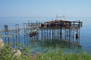 Traditional trabocco, wooden fishing house on platform of the Trabocchi Coast, Abruzzo, Italy, fishing concept