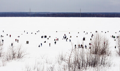 Novocheboksarsk,Russia-February 27, 2021:rybak rybak festival, fishing on the frozen river