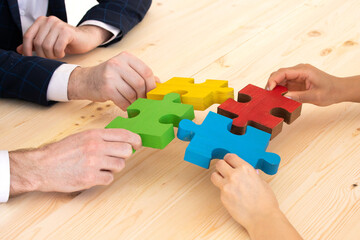 Business people with puzzle