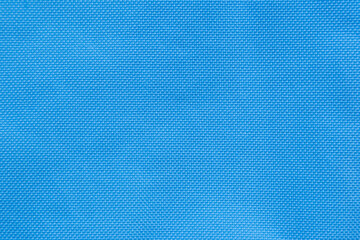 Fototapeta na wymiar Detail of blue fabric texture and seamless background