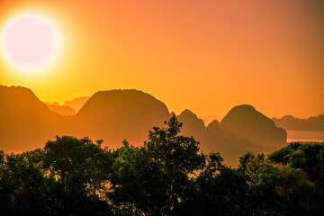 Nature blurred abstract background Of the colorful morning sun, a large lake, can see the scenery all around, cool atmosphere from the wind blowing all the time