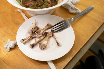 Empty plates of delicious street leftover food
