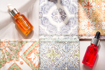 Two mockup bottles with pipettes on a tile background