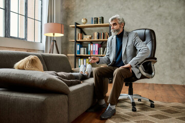 Psychotherapist talking to young caucasian woman on couch
